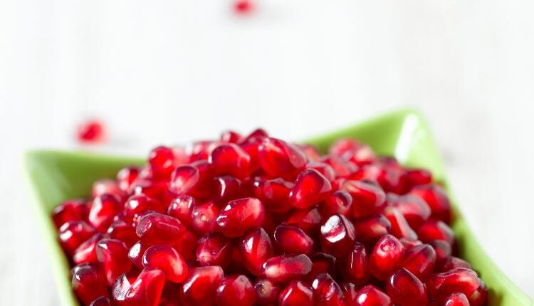 عکس استوک انار و آب انار – Grapefruit Fresh Juice Stock Photo