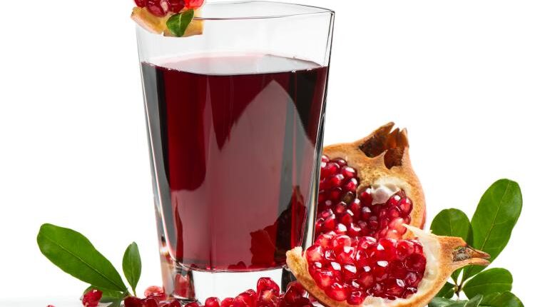 عکس استوک انار و آب انار – Grapefruit Fresh Juice Stock Photo