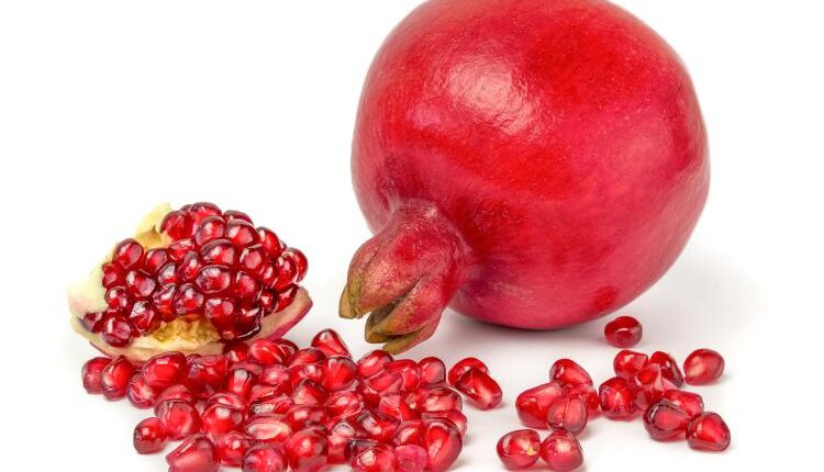 عکس استوک انار و آب انار – Grapefruit Fresh Juice Stock Photo