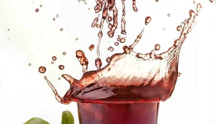 عکس استوک انار و آب انار – Grapefruit Fresh Juice Stock Photo