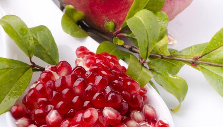 عکس استوک انار و آب انار – Grapefruit Fresh Juice Stock Photo