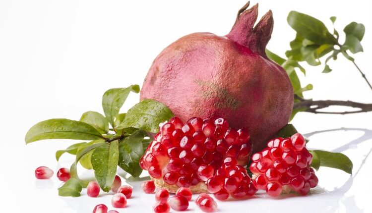 عکس استوک انار و آب انار – Grapefruit Fresh Juice Stock Photo