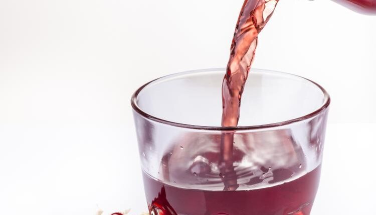 عکس استوک انار و آب انار – Grapefruit Fresh Juice Stock Photo