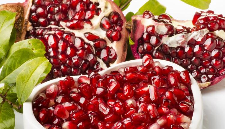 عکس استوک انار و آب انار – Grapefruit Fresh Juice Stock Photo